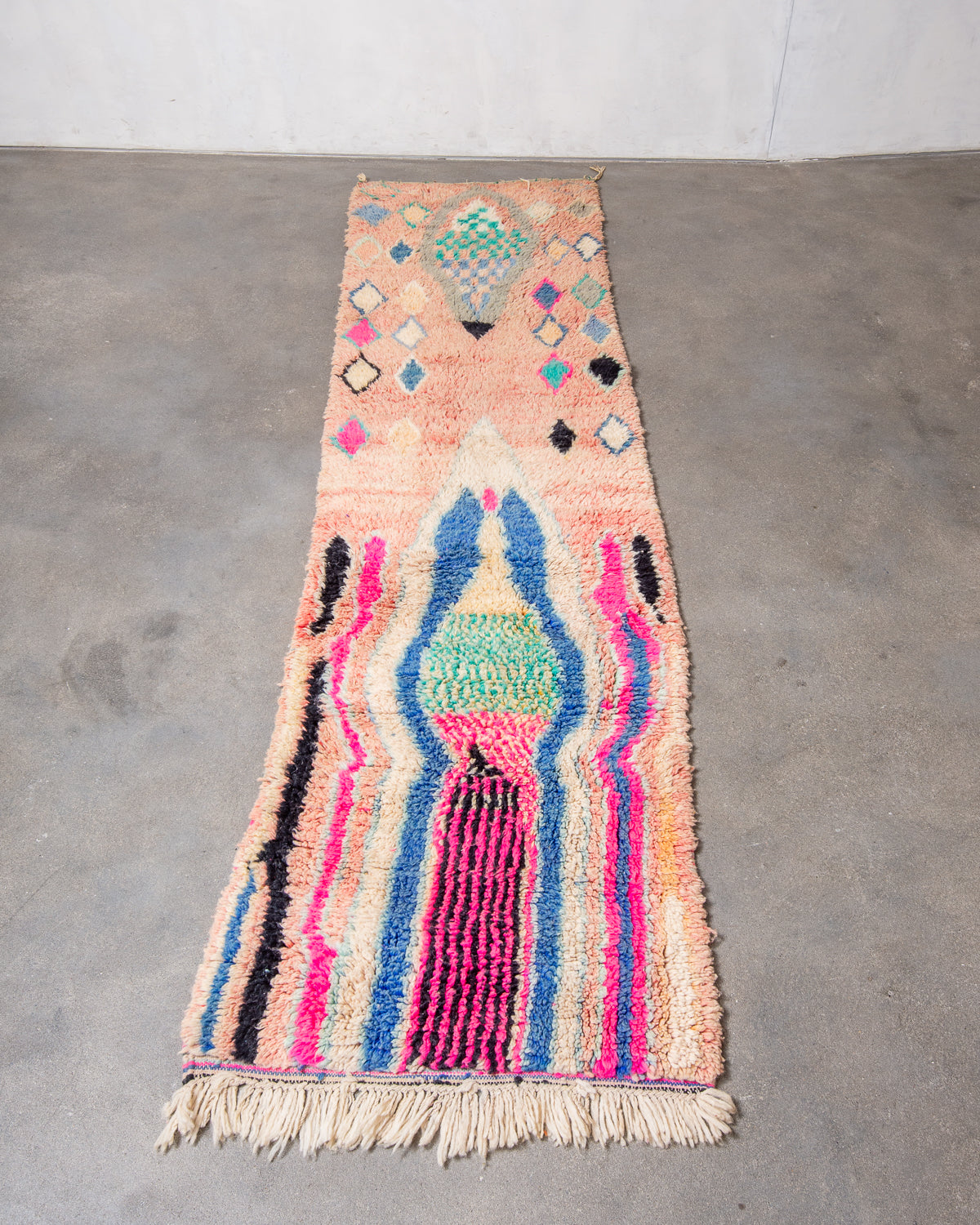 Modern, designer, handcrafted Berber runner rug from Morocco. Beniourain carpet with beautiful colours and patterns and fluffy wool texture.
